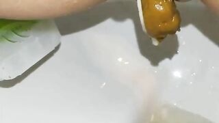 Juicy and creamy poop closeup