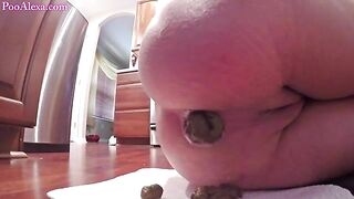 Lusty girl pooping big hard turd in closeup