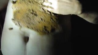 A woman pulls her ass cheeks apart so you can see all the shit