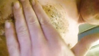 Rubbing shit on her body