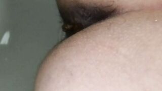 Woman takes a shit in the bathtub