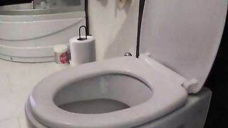 Hot tattooed wife pooping in toilet