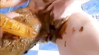 Dirty girl masturbating with a lot of shit