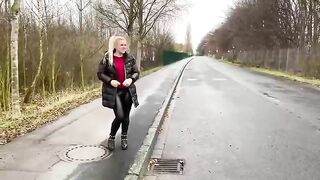 Stunning blonde girl poops hard on the road