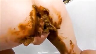 Stunning babe smear shit on butt