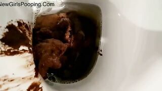 Huge turd really stretches her asshole