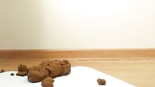 Beautiful babe in red dress teasing and pooping