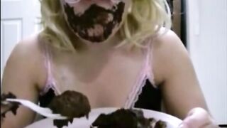 Dirty girl in mask eating her shit