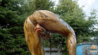 Playing in a bathtub full with cow shit