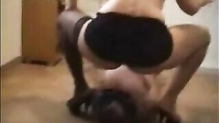 Mistress in high heels shitting for slave