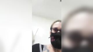 Girl in fishnet stockings squats and takes a huge shit in a public toilet