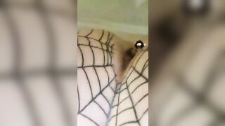 Girl in fishnet stockings squats and takes a huge shit in a public toilet