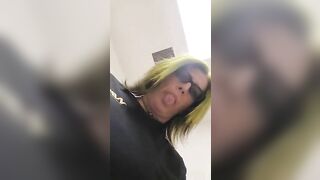 Nerdy lady in glasses pooping show