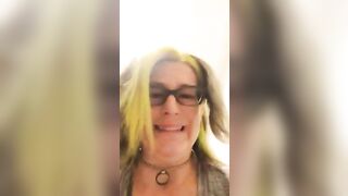 Mature lady in glasses pooping