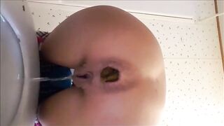 Petite babe shitting a huge turd