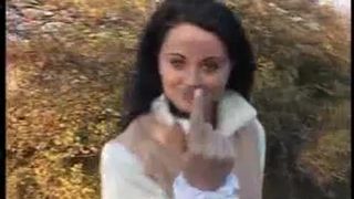 Teen brunette shitting in the forest