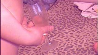 Licking her middle finger