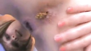 Russian girl smears poop on her face