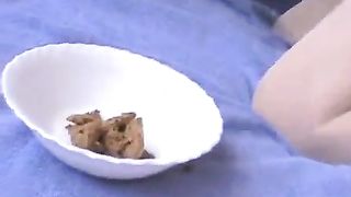 Russian girl smears poop on her face