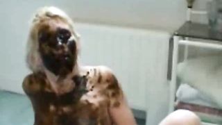 Blonde MILF giving a scat blowjob