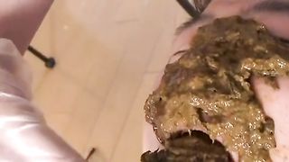 Creamy yellow poop on her slaves face