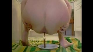 Eating poop from a plate