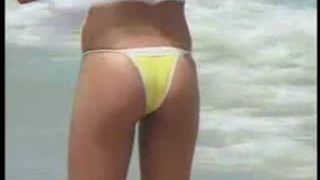 Indian girl shitting on the sand