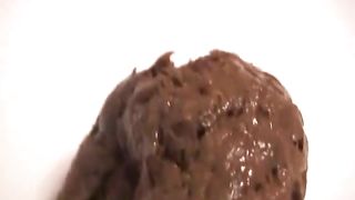 Sniffing her fresh shit