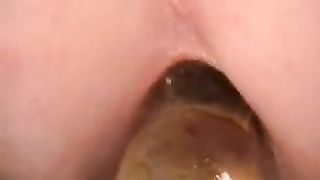 Lucy fucking with a glass dildo