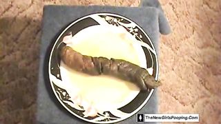 Shitting on a white plate