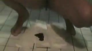 Horny latina pooping on the bathroom floor