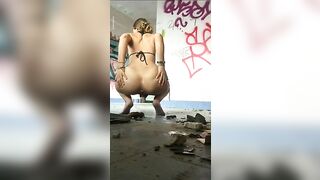 Girl in bikini squats to take a huge shit on the floor