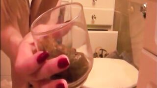 Beautiful babe poops in the glass