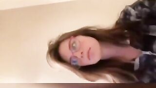 Nerdy brunette girl pooping