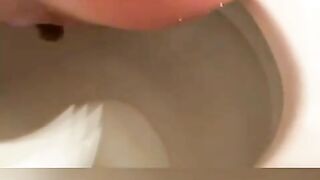 Nerdy brunette girl pooping