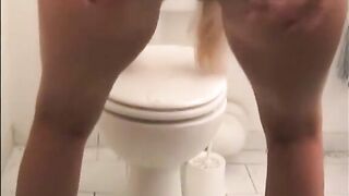 Hot chick spreading asshole for pooping