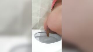 Turkish girl pissing and shitting