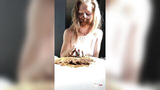 Pretty brunette girl eating shit