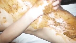 Rubbing shit on her gorgeous boobs