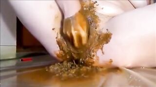 Smearing shit while masturbating