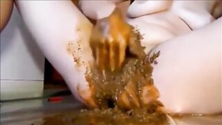 Smearing shit while masturbating