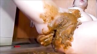 Smearing shit while masturbating