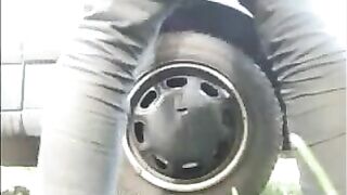 Woman fills up her ass while outside