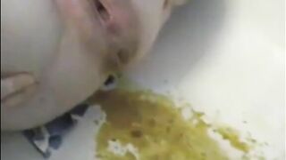 Lady shitting liquid after enema