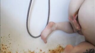 Young girl shitting diarrhea in the bathtub