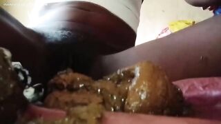 Dark black girl pooping in her panties