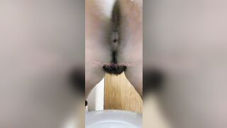 Thick hairy pooping closeup