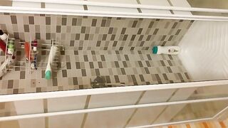 Cute blonde skinny babe pooping in the shower