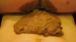 Pooping on his stomach