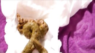 Sweet girl shitting in a diaper